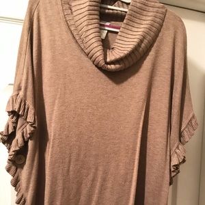 Beige short sleeved top.